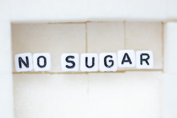 No sugar recommendation, text from letter beads on sugar cubes