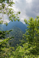 Fototapeta na wymiar Carpathians nature landscape of rocky Fagaras mountains in cloudy weather at Romania, spectacular wilderness scenery
