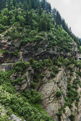 Carpathians nature landscape of rocky Fagaras mountains in cloudy weather at Romania, spectacular wilderness scenery