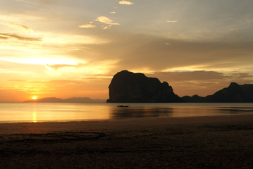 View of beautiful sunset is seeing from the sea beach.