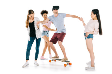 Obraz premium girls and young man on skateboard