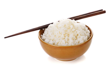 Fototapeta na wymiar Rice in a bowl on a white background