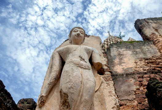 Heavenly walking Buddha image in Sisatchanalai, Sukhothai, Thailand