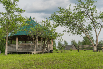 Arbor in the garden in the Russian countryside.