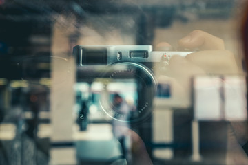 Photographer shooting reflection