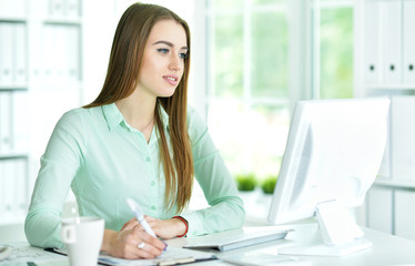 young woman in office