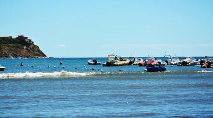 Obraz premium Piombino, Salivoli, Tuscany, Tyrrhenian sea and boats, panoramic view and landscape