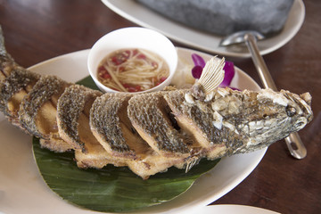 Sour soup with fish fry and water mimosa