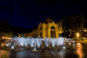 Main colonnade and singing fountain at night - center of Marianske Lazne (Marienbad) - great famous...