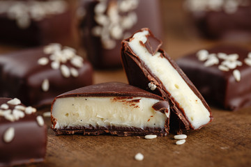 Cut handmade chocolate candies with sesame seeds