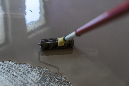 Mirror smooth surface of the floor. Floor covering with self lev