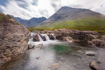 Fototapeta na wymiar Famous Fairy Pools on the Isle of Skye, Highlands, Scotland