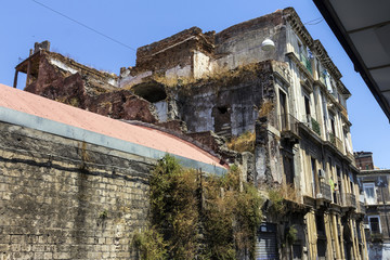 Street in Catania with ruined buildings