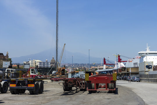 Port of Catania with the volcano Etna in the background