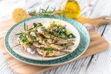 Healthy sardines with potato and chard