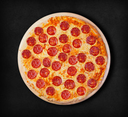 Pepperoni pizza on a black background. Visit my page. You will be able to find an image for every...