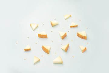 Pieces of melon on blue background