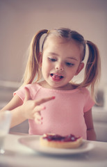 Girl having breakfast.