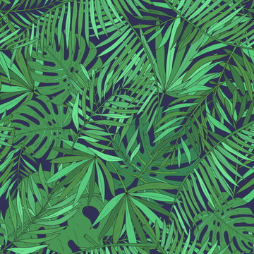 Seamless pattern with tropical palm leaves. Green exotic background.
