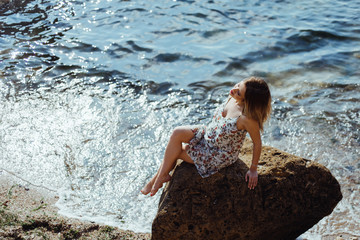 Beautiful pregnant woman on a walk in nature