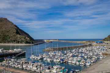 Fototapeta na wymiar Boats in the harbor of Orio, Spain