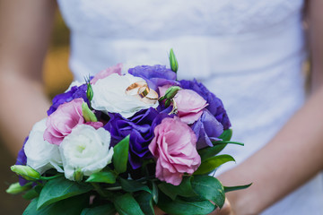 Obraz na płótnie Canvas Bridal bouquet and bride close up no face