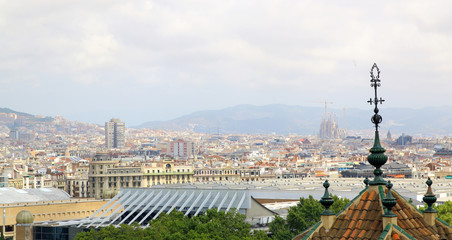 Fototapeta na wymiar Aerial View of Barcelona with the Sagrada Familia