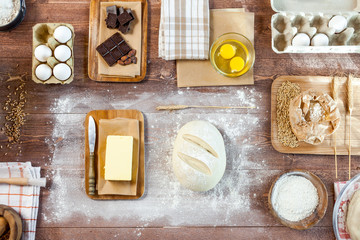 fresh dough on kitchen  rustic wooden table. top view