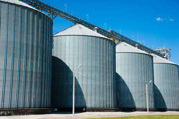 Fototapeta premium Steel grain silos used to store grain