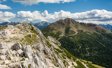 Fototapeta na wymiar Amazing mountains summer landscape in Dolomites, South Tyrol, Italy. White Peak and Black Peak in the Oclini Pass