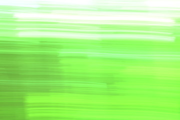 Abstract blurred background with green and white color