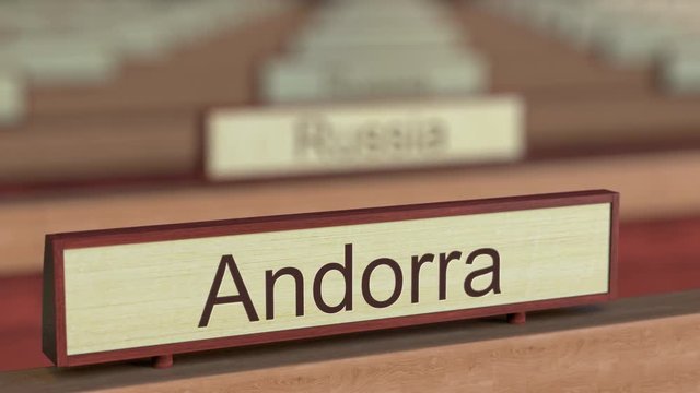 Andorra name sign among different countries plaques at international organization. 3D rendering