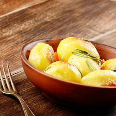 Boiled and baked potato and vegetables