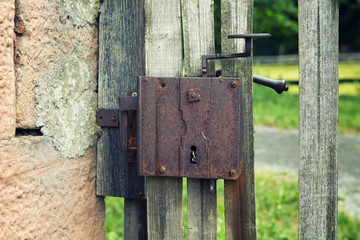 old wooden fence with door handle
