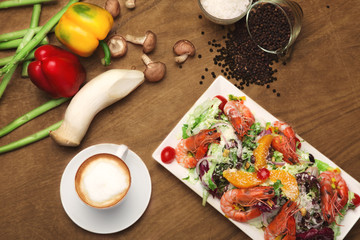 Salad with capuchino decoration on the wooden table - 168066666