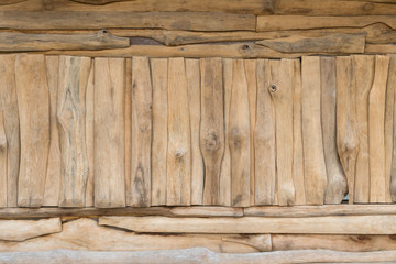 Old brown wooden wall is not equal.