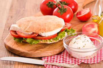 Puccia bread with mozzarella and tomato. 