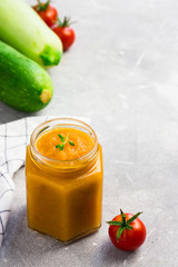 Homade squash spread in a glass jar, Russian cuisine. Selective focus, space for text.