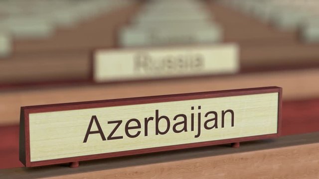 Azerbaijan name sign among different countries plaques at international organization. 3D rendering