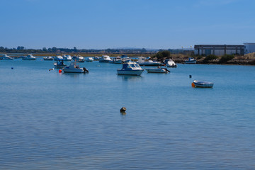 Fototapeta na wymiar Boats in the marina of the town of Sancti Petri in Chiclana, Cadiz, Spain