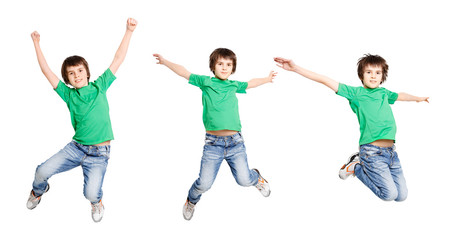 Cheerful boy jumping on white isolated background