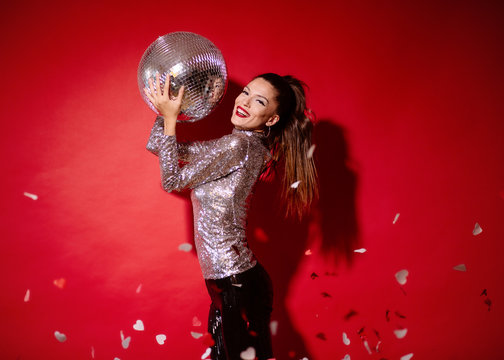 Woman with disco ball 