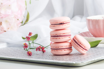 Pink strawberry macarons. French delicate dessert for Breakfast