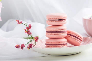 Pink strawberry macarons. French delicate dessert for Breakfast