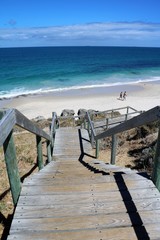 Wooden stairs to Indian Ocean and Cottesloe Beach in summer, Western Australia 