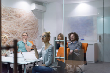 Startup Business Team At A Meeting at modern night office building