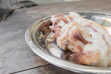boil pork in steam pot, selective focus;