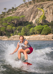 Funny wakeboarding sport on the lake