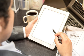 businessman check demand supply economics in all quarter and reading book in website or proposal play social media on gadget display isolated