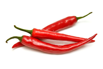 Red chili peppers isolated on white background. Flat lay, top view